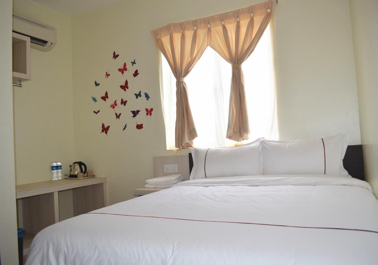 Angsoka Hotel Teluk Intan Extérieur photo